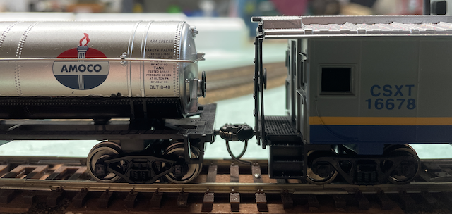 Tank Car and caboose coupled together